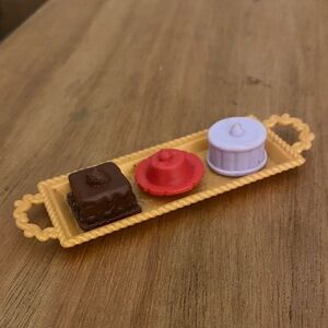 a Tray of Desserts accessory, which includes miniature representations